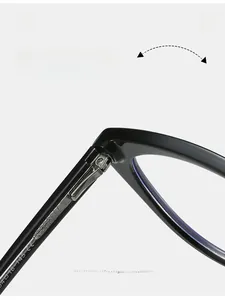 Macro detail of durable metal hinge and size specs on black TR90 cat eye glasses