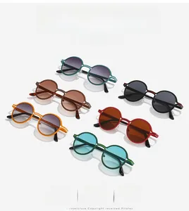 Macro view of stylish round sunglasses in multiple vibrant colors with metal temple detail
