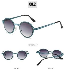 Detail view of peacock green round retro sunglasses with gradient lenses and metal temples