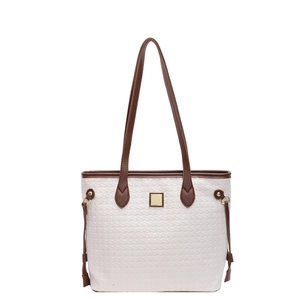 Retro woven tote bag with brown handles and gold buckle on a white background