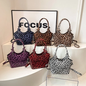 Fashionable leopard print bucket bags in six vibrant colors with glossy animal texture