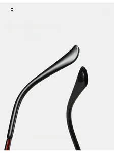 Close-up of curved ergonomic mirror legs on high-gloss black sunglasses for comfort