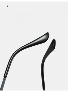 Detail of curved ergonomic temple arms on small frame sunglasses for comfort