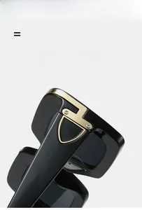 Close-up of durable golden metal hinges on stylish black sunglasses with lightweight frame