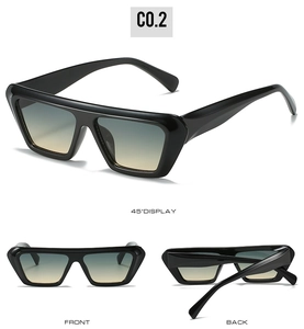 Detail view of square flat top sunglasses with blue-yellow gradient lenses and black frames