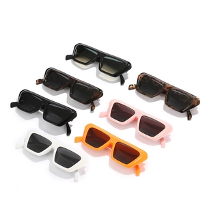 Collection of seven colorful retro square flat top sunglasses in a stylish diagonal layout