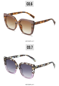 Detail view of square sunglasses in brown tortoiseshell and blue floral pattern at 45°