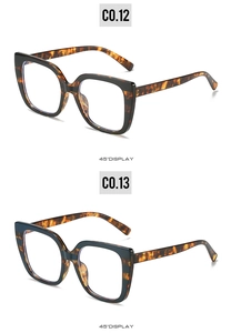 Detail view of square oversized tortoiseshell sunglasses in C0.12 and C0.13 dual-tone frames