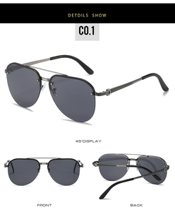 Detail view of retro aviator metal sunglasses with double bridge and textured temple arms