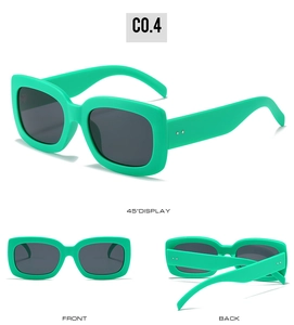 Vues détaillées des lunettes de soleil carrées vert vif avec larges branches et verres gris