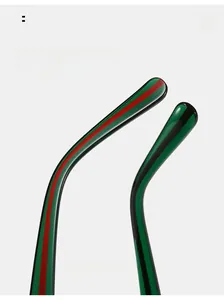 Detail of ergonomic curved sunglasses temples in green and red stripe finish