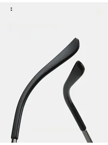 Detail of ergonomic curved black sunglass temples for comfortable wear with metal accents