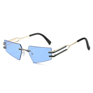 Fashionable rimless cat eye sunglasses with sky blue geometric lenses and gold metal frame