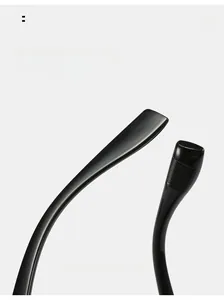 Detail of curved black sunglasses legs featuring comfortable arc design and glossy finish