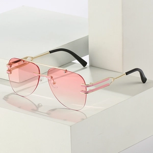 Lunettes de soleil aviateur sans monture avec verres dégradés roses et monture dorée