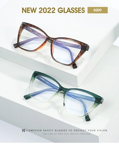 Cat-eye blue light blocking glasses in tortoiseshell and green gradient frames