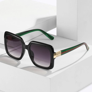 Retro square oversized sunglasses with gradient lenses and iconic striped metal temples