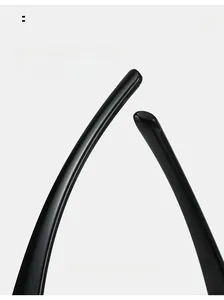 Detail view of high-gloss curved mirror legs on black sporty hip-hop sunglasses