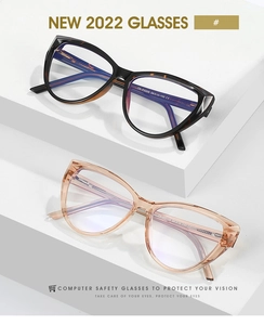 Detailed view of cat-eye glasses frames with tortoiseshell and champagne color finishes