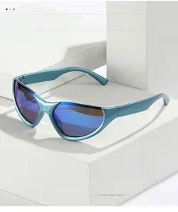 Detail of matte blue sports sunglasses featuring sleek streamlined frame and mirrored lens