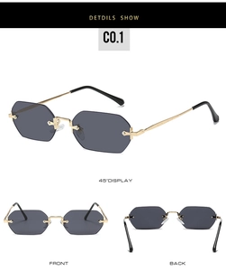 Multiple views of octagonal rimless sunglasses with gold temples and grey tinted lenses