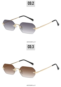 Detail of rimless geometric sunglasses with gold metal cross hinges and gradient lenses