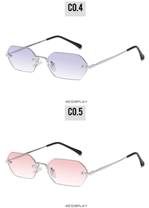 Detailed 45-degree view of rimless octagon sunglasses in purple and pink gradient lenses
