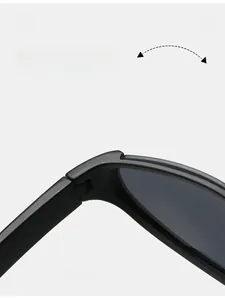 Macro shot of durable matte black sports sunglasses hinge showing folding mechanism