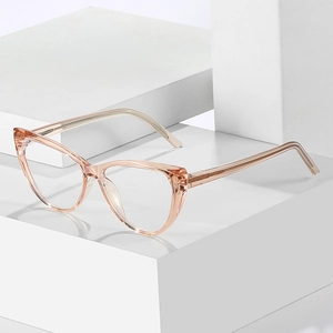 Transparent champagne cat eye anti-blue light glasses frame on a white display stand