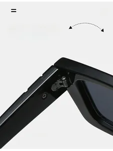 Close-up of durable metal hinge with screws on retro square black sunglasses