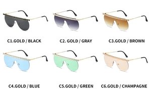 Detail showcasing six color variants of oversized rimless sunglasses with rhinestone trim