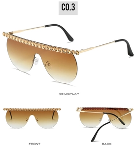 Three-angle view of oversized rimless sunglasses with gradient lenses and rhinestone trim