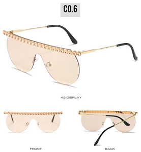 Front and back detail of oversized rimless sunglasses with champagne hexagonal rhinestones