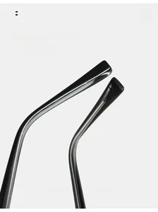 Close-up of ergonomic curved black temple legs on blue light blocking glasses frames