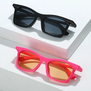 Fashionable sports sunglasses in black and hot pink with rectangular plastic frames