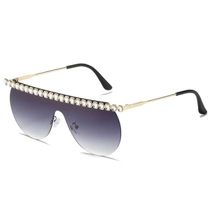 Oversized rimless sunglasses with purple gradient lenses and sparkling rhinestone trim