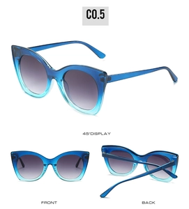 Three-angle view of oversized cat-eye sunglasses with blue gradient frame and grey lenses