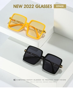 Detail view of square rimless sunglasses with metal hollow lettering on the side frames