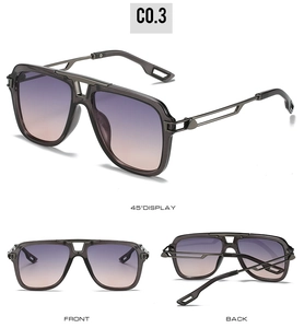 Vue détaillée de lunettes de soleil carrées avec branches évidées et verres dégradés