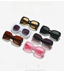 Detailed view of fashion square sunglasses in diverse colors with gold rivet accents