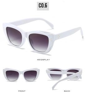 Three-angle view of white cat-eye sunglasses with purple gradient lenses and gold dots