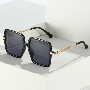 Modern square oversized sunglasses with gold metal temples and rhinestone LOVE decoration