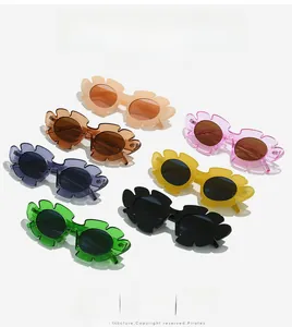 Close-up of colorful sunflower-shaped sunglasses in vibrant shades on white background