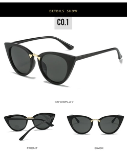 Detailed views of black cat-eye sunglasses with gold metal bridge and dark grey lenses
