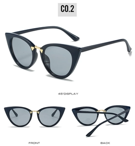 Detailed views of cat-eye sunglasses with gold bridge accent and dark lenses