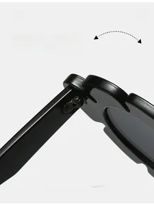 Macro shot of durable metal hinge detail on black acetate sunflower cat eye sunglasses