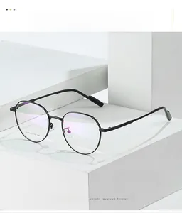 Macro detail of black metal optical frame with anti-blue light purple coating lenses