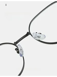 Detailed close-up of soft silicone nose pads on lightweight black anti-blue light glasses