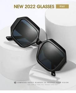Close-up of black oversized hexagonal glasses frame with protective blue light lenses