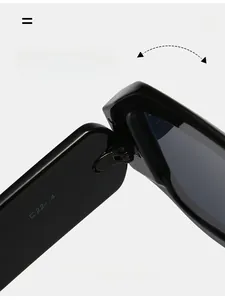 Close-up of durable metal hinge and size specifications on black sunglasses frame